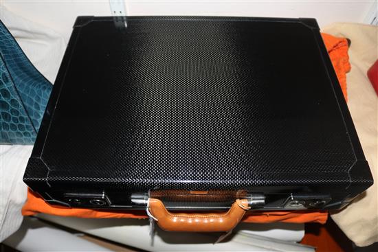 An Hermes of Paris tan leather and carbon fibre briefcase, 16.75in.
